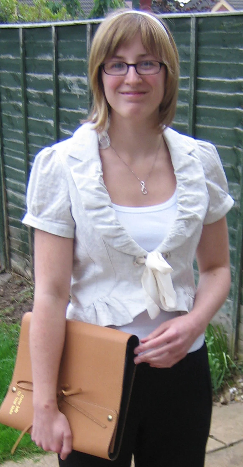 Me in 2007, showing off the new leather embossed portfolio I had made