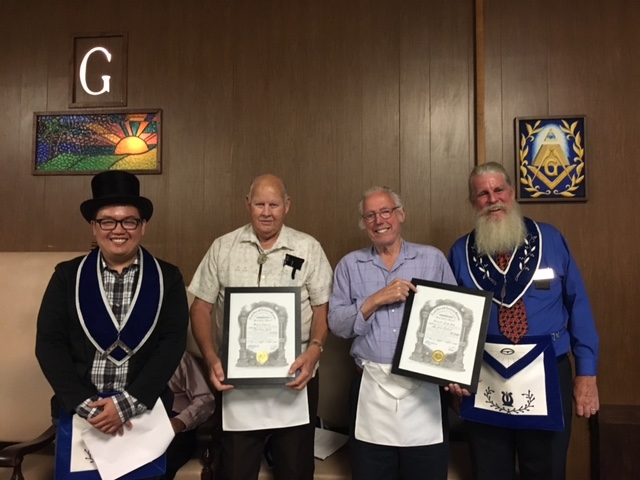 Wor. John Lawler (middle left) and Wor. Lee Cleveland (middle right) receiving their certificates from WM Edward Dalusong (left) and Bro. Mike Lampe (right)