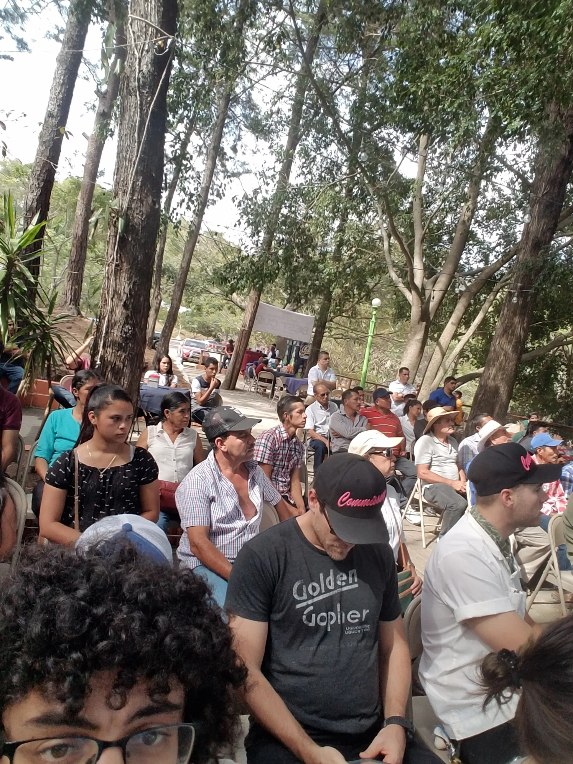 crowd of people sitting in rows