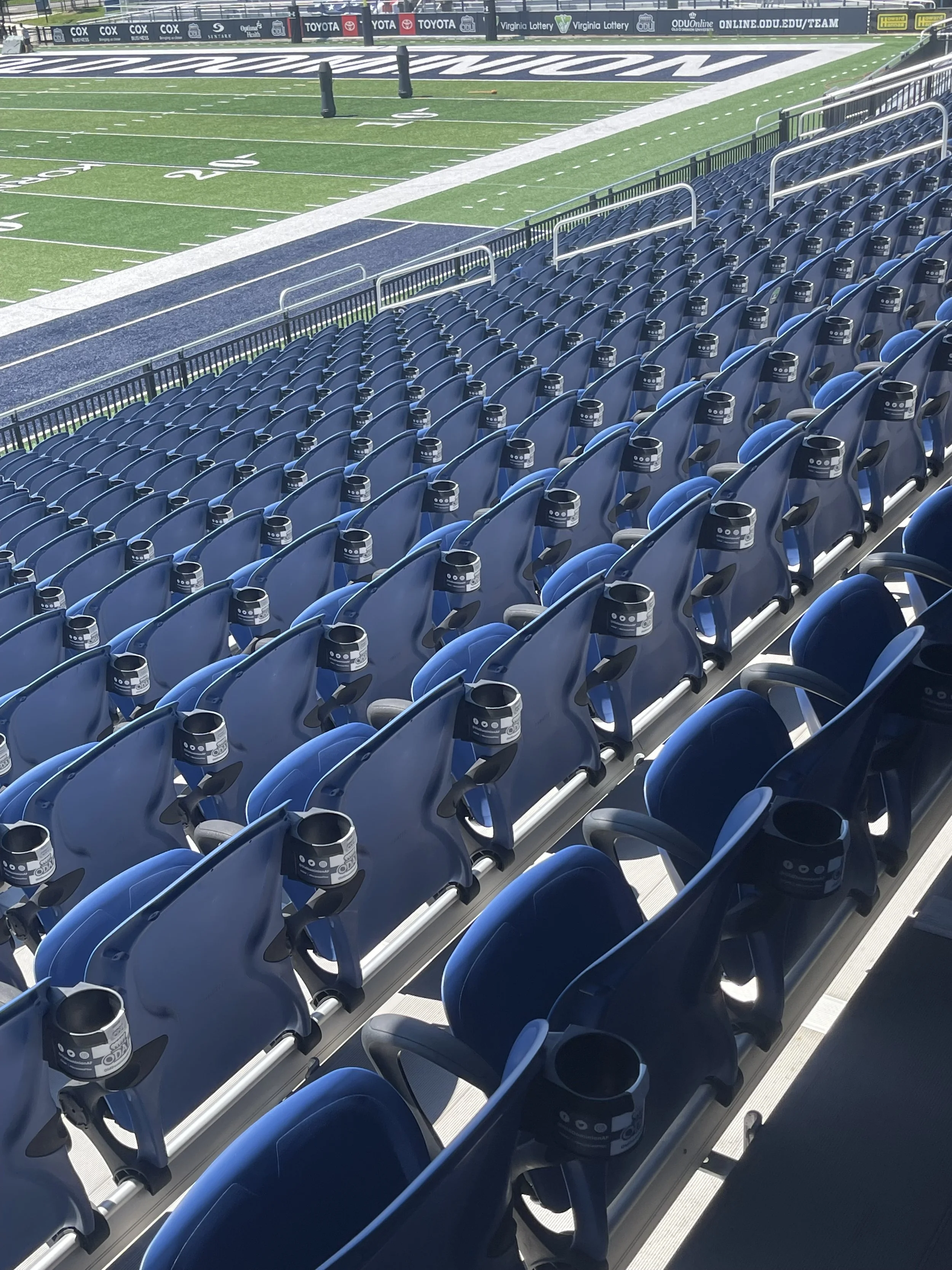 ENHANCING THE FAN EXPERIENCE - BRANDED CUPHOLDERS FOR RAIL STYLE SEATS ARRIVE AT OLD DOMINION UNIVERSITY S.B. BALLARD STADIUM 