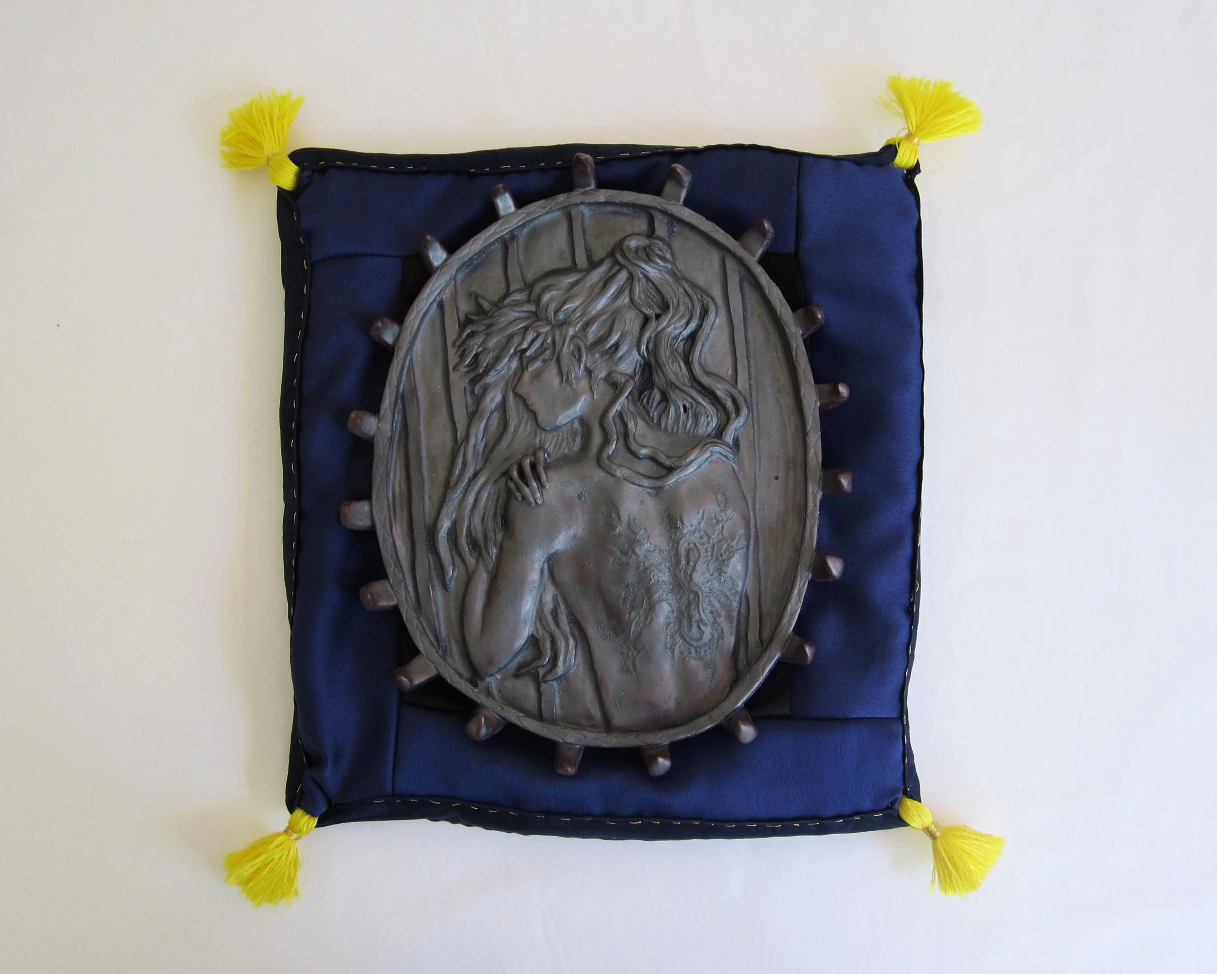 Naraku, 2017 glazed porcelain, satin, synthetic ribbon, embroidery floss, cotton scrap stuffing 12 x 12 1/2 x 2 inches