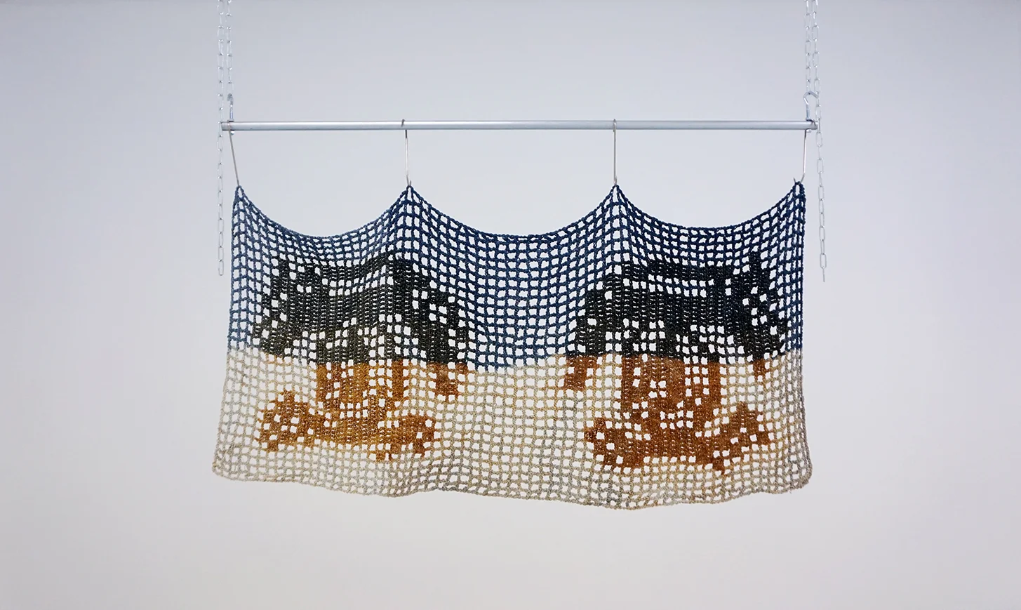 giant dish towel / the Love Interest / blue highlights, 2018 Cotton twine dyed with indigo and rust, metal pole, meat hooks, chains 39 x 70 x 2 inches