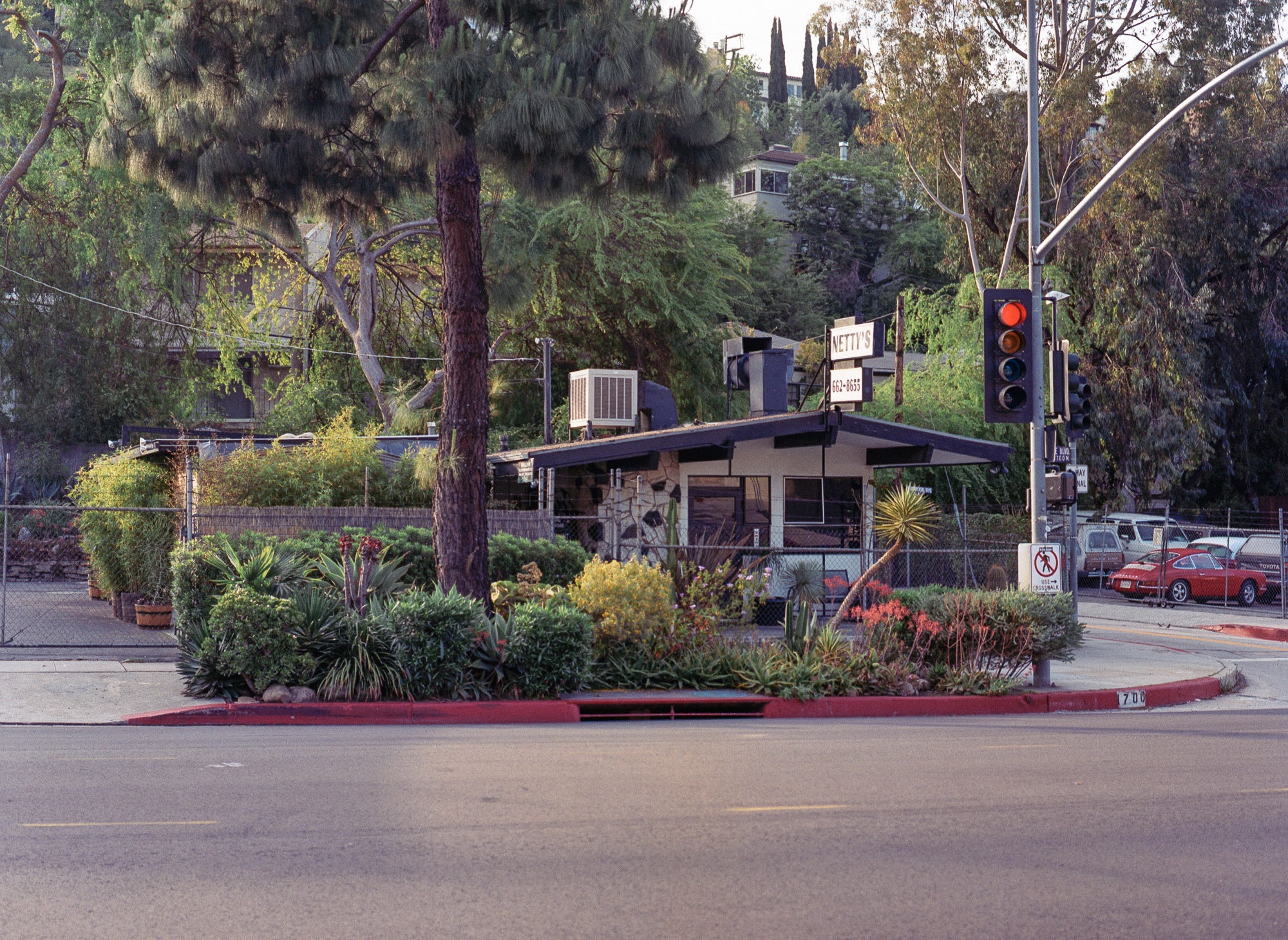 few places symbolize more to me. netty's was mentioned in the beastie boys song, way before i knew what it was. when i first moved to silverlake, i would often see john c reilly camped out there on a weekday with a bunch of newspapers. it disappeared just as i was leaving. this photo was part of a series i did for a show at colette in paris I HEART LA. 