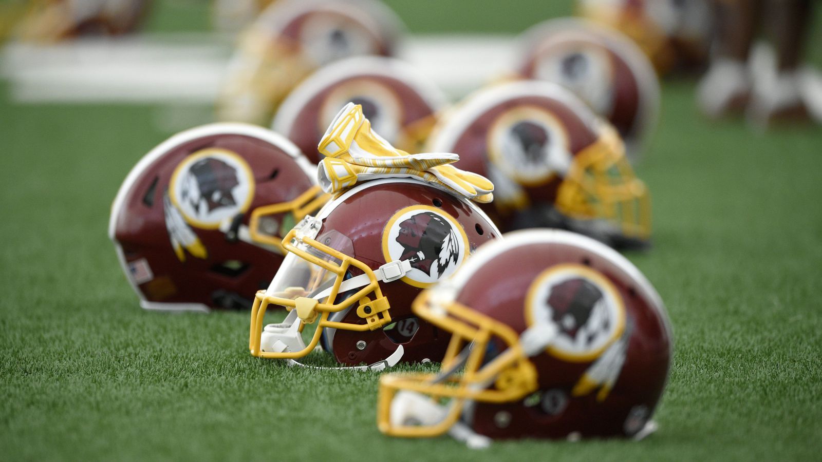 Research the controversy over the racist Sports team logo and names. Start HERE .