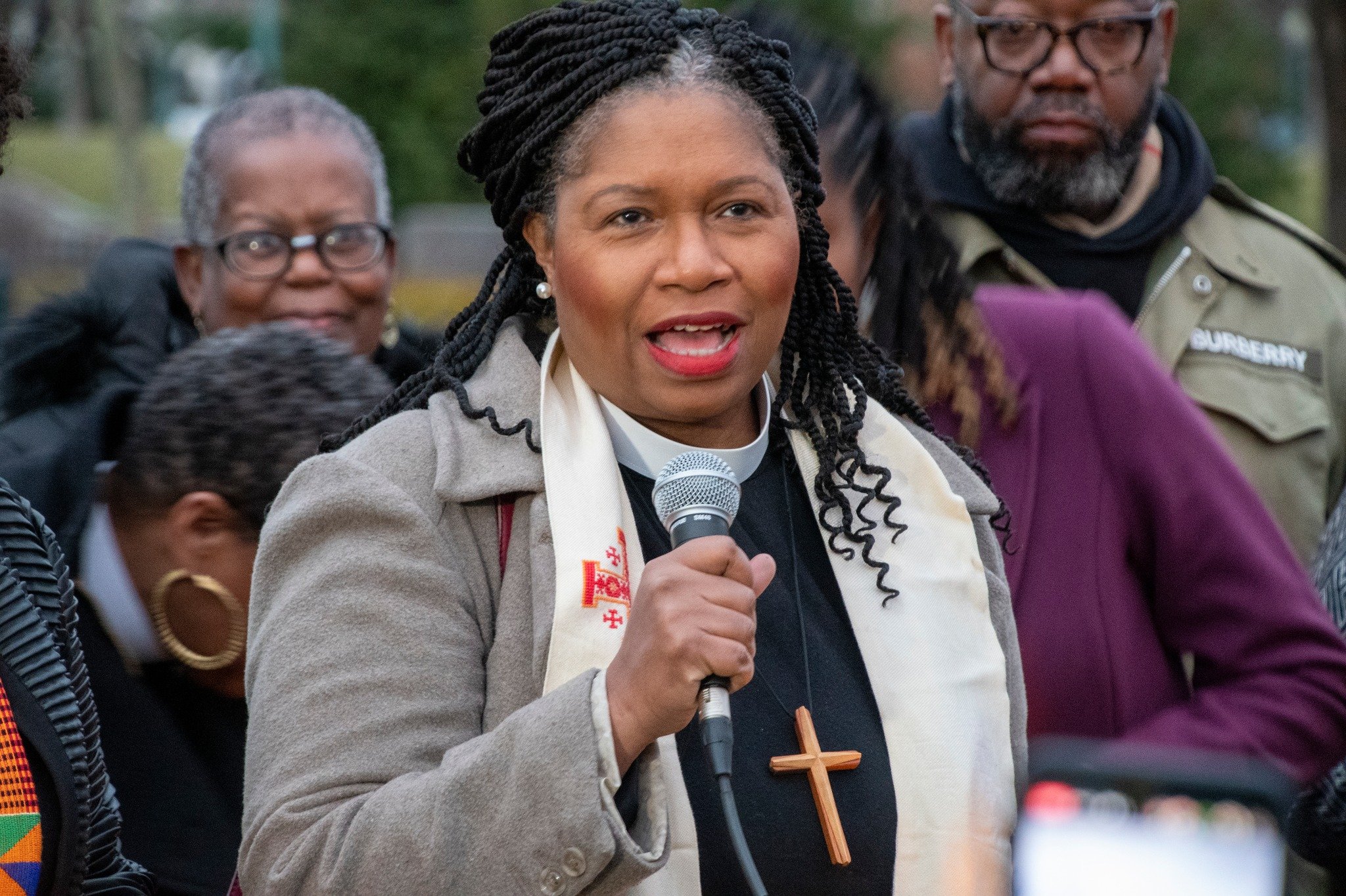  Rev. Dr. Leslie Copeland-Tune, COO of the National Council of Churches, prays at the vigil. 