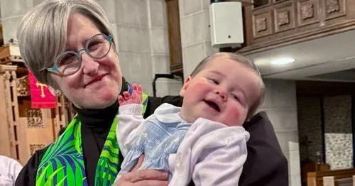 One of the sweetest moments of Palm Sunday was watching our community make a promise.

Pastor Julie held this sweet little one as the Golden Family made their dedication, committing to raise their child in faith, love, and community. And then she tur