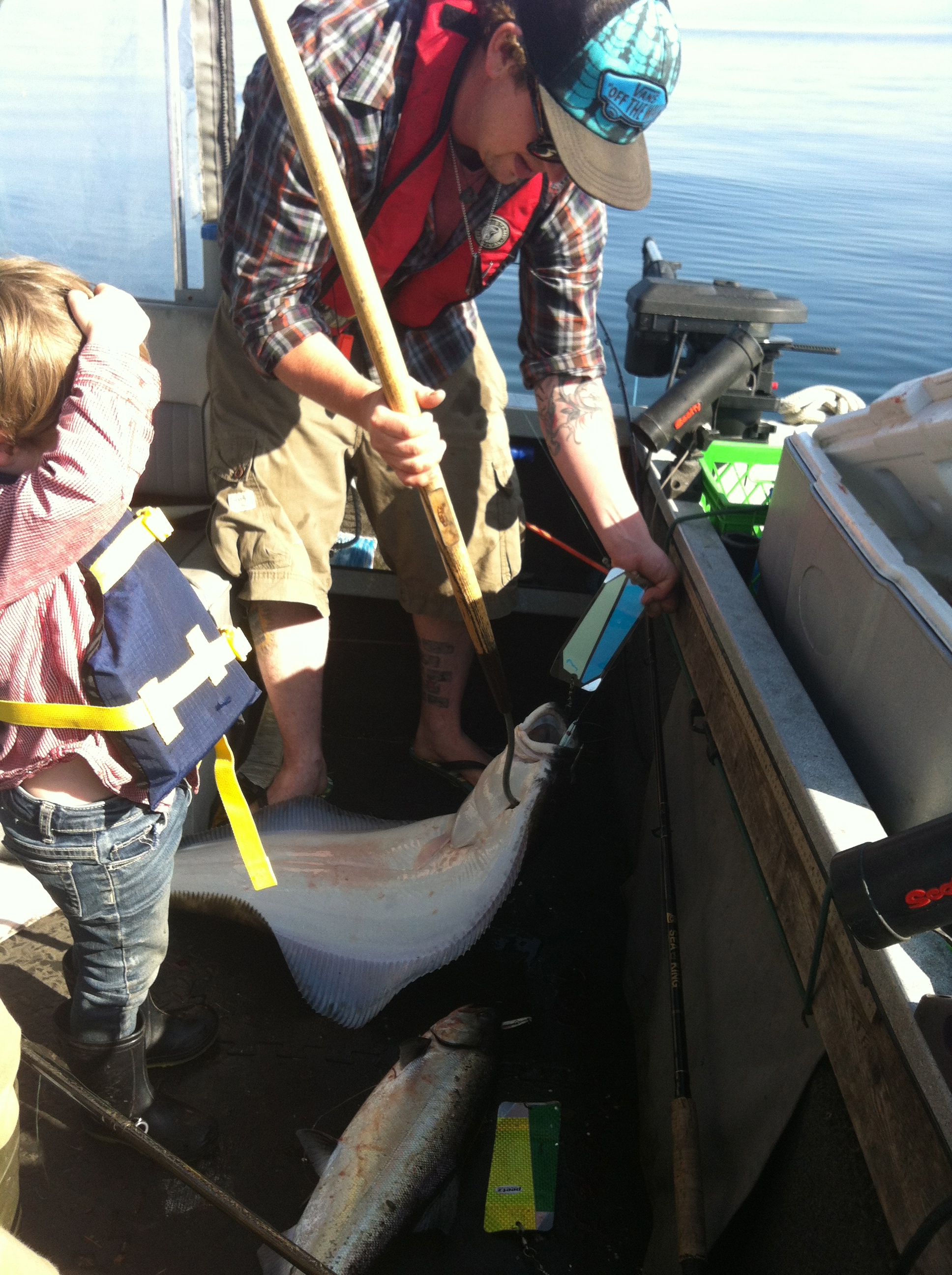 Dave with a halibut and chinook double header on Constance Bank in Victoria, BC.