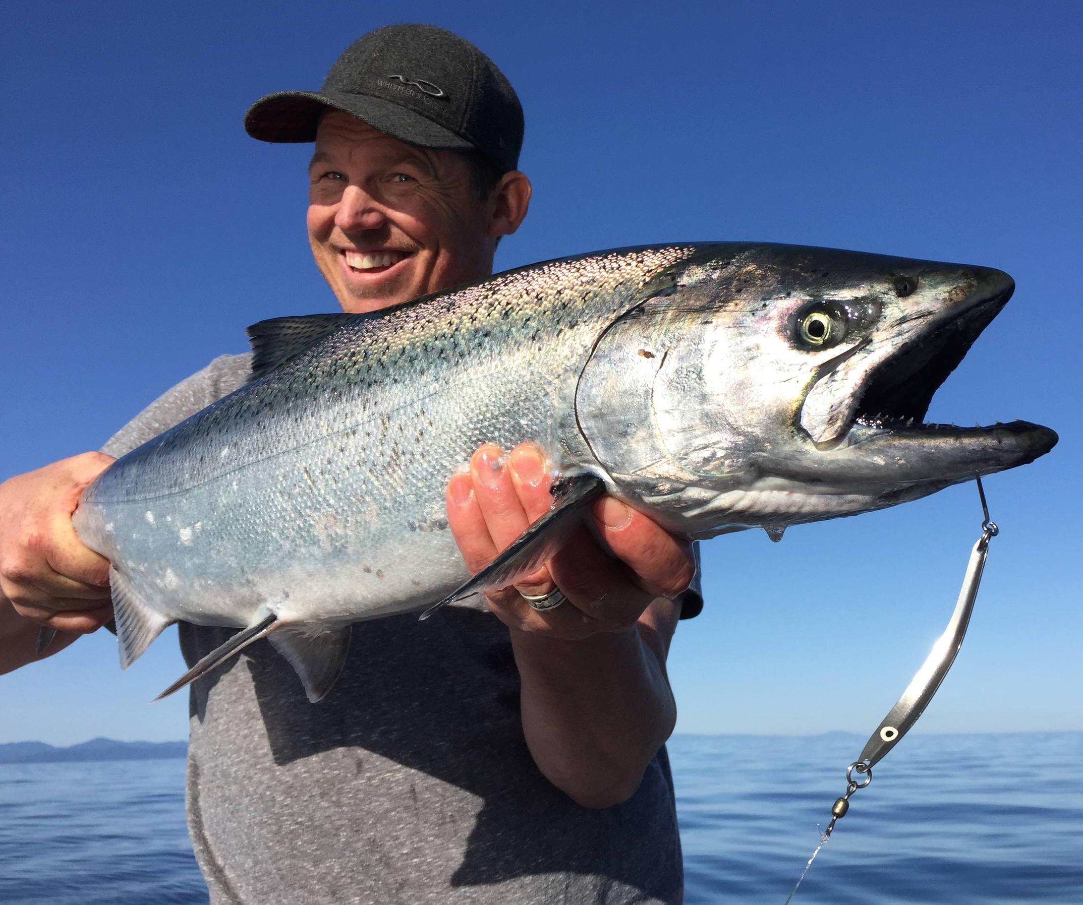 Dave of Ocean Dreams Charter Co. with a nice Chinook on a perfect Sooke day on an AP Sandlance Spoon.