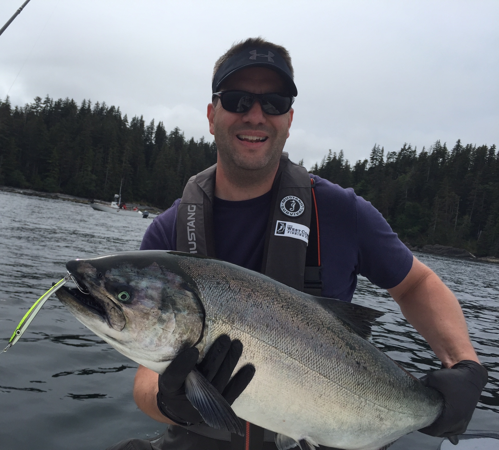 Jim catching and quickly releasing one of many large chinook in Haida Gwaii on the AP Sandlance Spoon.