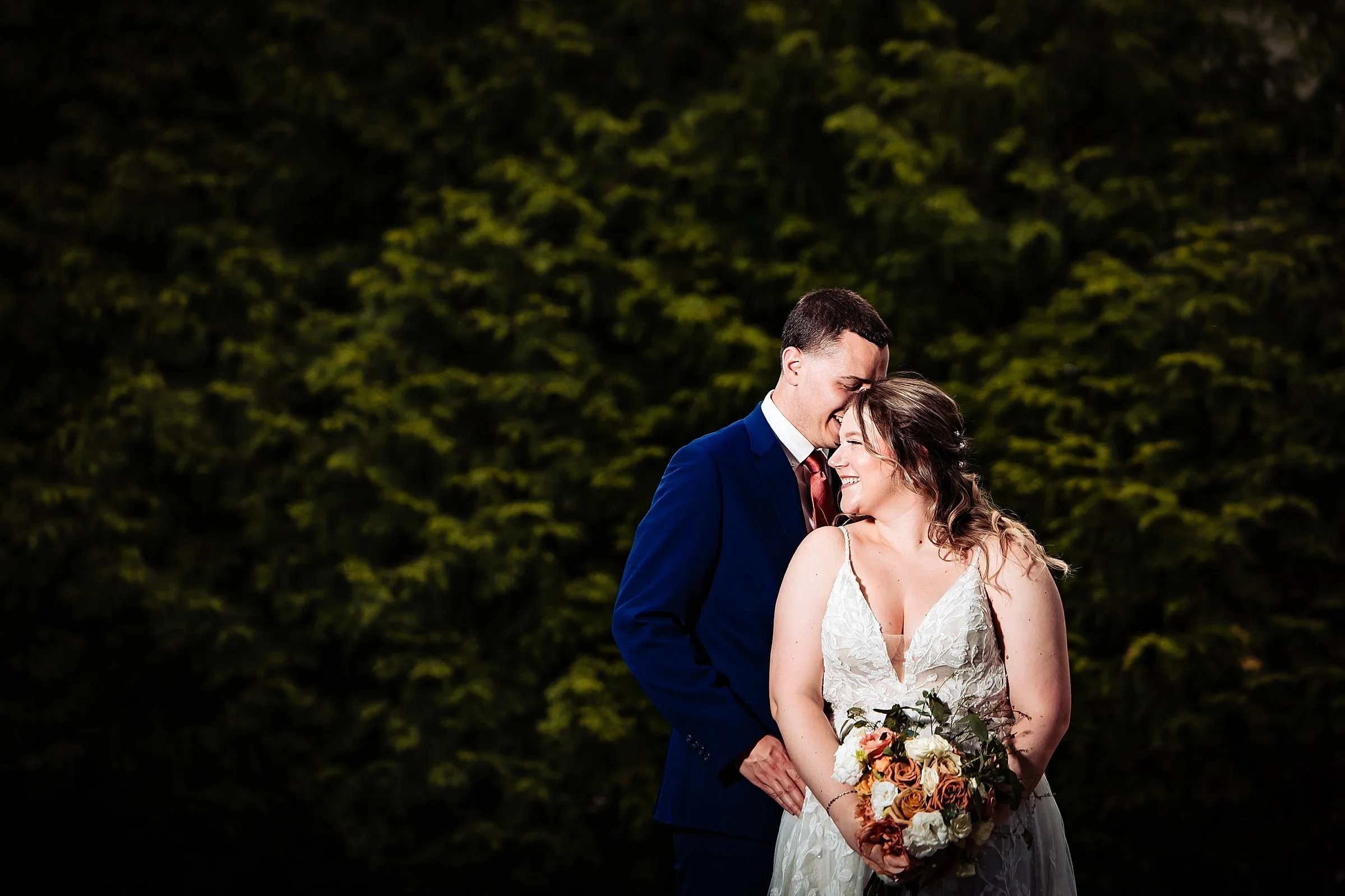 Jacklyn and Evan in front of the trees at Pen Ryn Estate