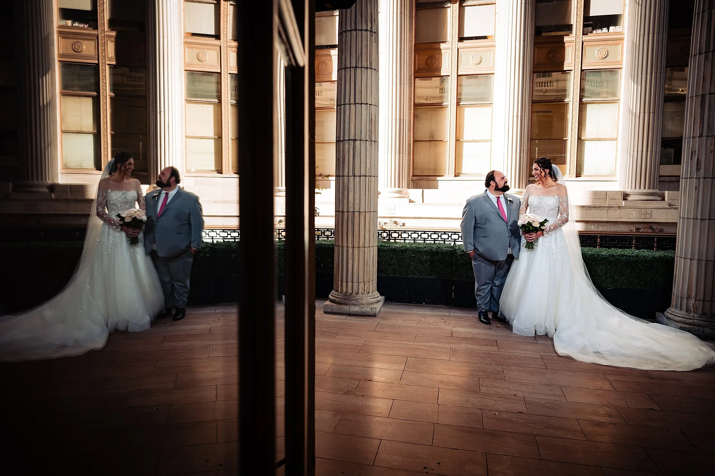 Grace and Tom by a mirror at Ballroom at the Ben