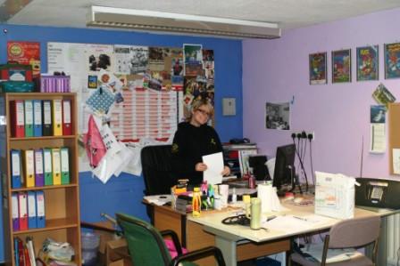 Lou at her desk