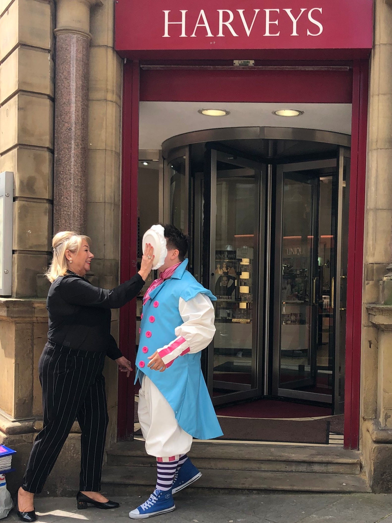 Getting a pie in the face outside Harvey’s