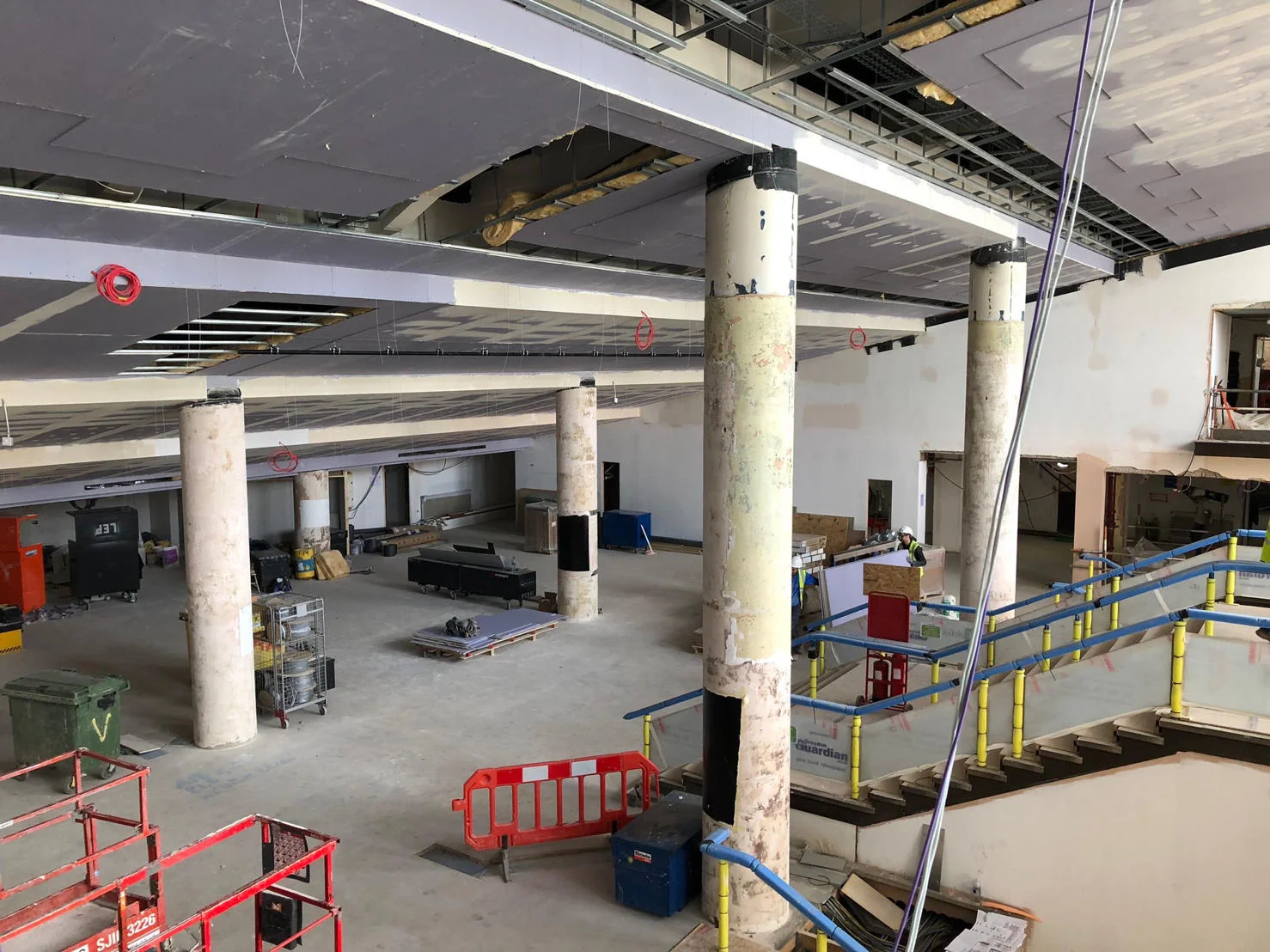 The foyer scaffolding is all down, and the painters have moved in!