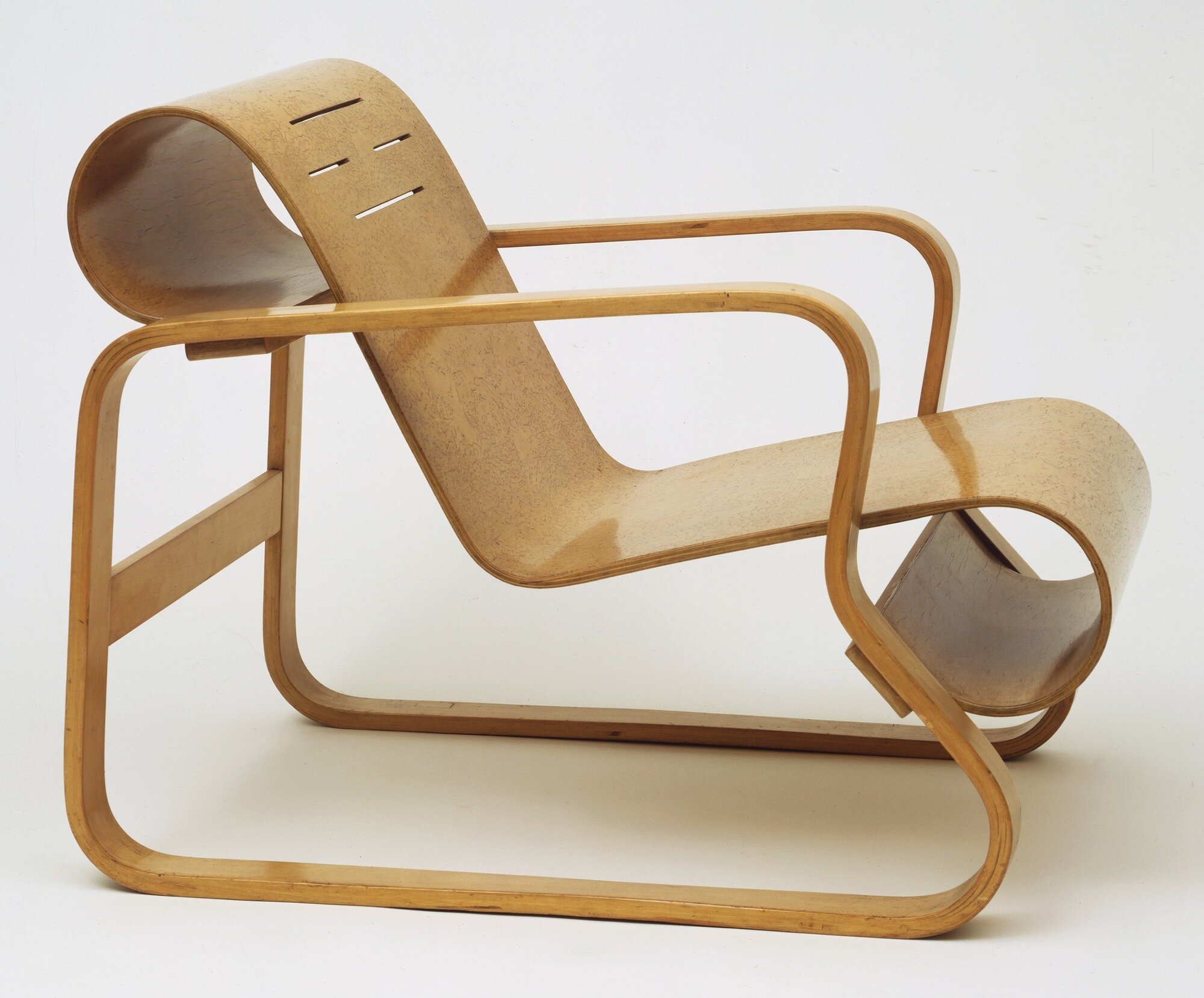 Molded plywood “Paimio” chair by Alvar Aalto.