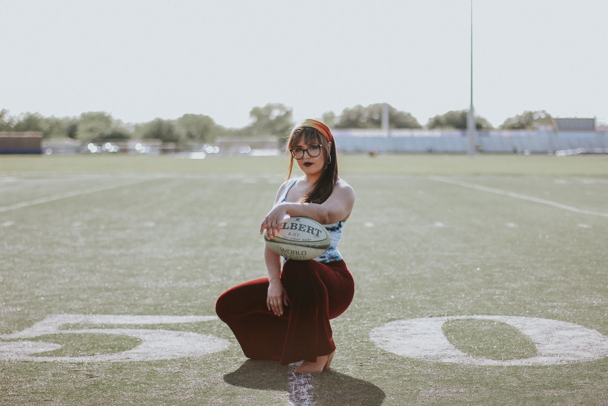 Alexandria Soto - freshman journalism major from San Antonio, TX. Alex earned a starting position on the men's rugby team in the fall of 2016. In 2017, she started the women's rugby team. "Rugby was a sport I picked up by having current members persuade me to come to a practice. I loved the intensity of the game and the brotherhood these boys set. I was hooked instantly and did everything I could to educate and train myself to be a successful player. My fashion inspiration resides from the hippie era of the 60's where bell bottoms, high waisted jeans, and multi patterned tops fit together perfectly to create this free spirited attire."