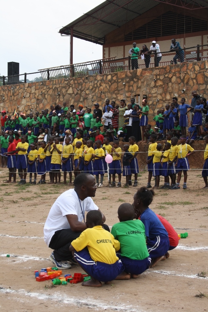 Teacher Joseph helped encourage the students before each activity as the crowd watched on.