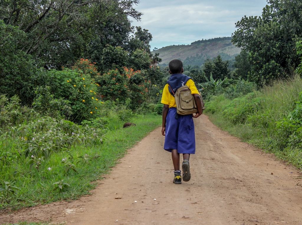 Goretti starts her day early, waking around 5am and walks for over an hour to fetch water before walking to school. 