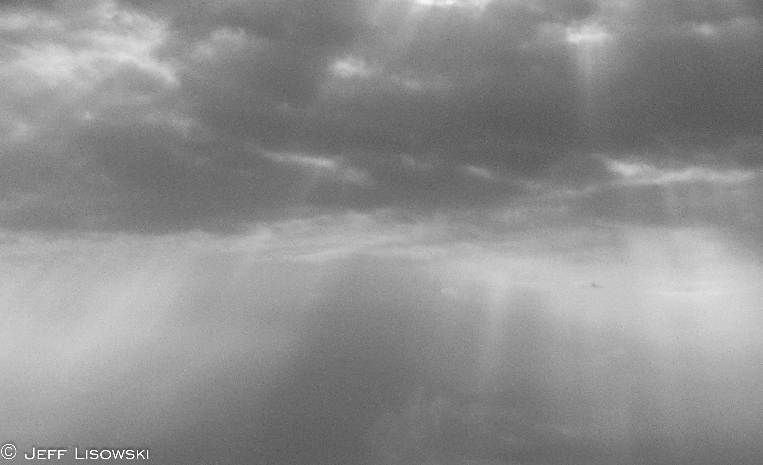 Once in a great while Iraq showed us there was a small amount of beauty in a war torn country. Here the sun was breaking through some clouds. 