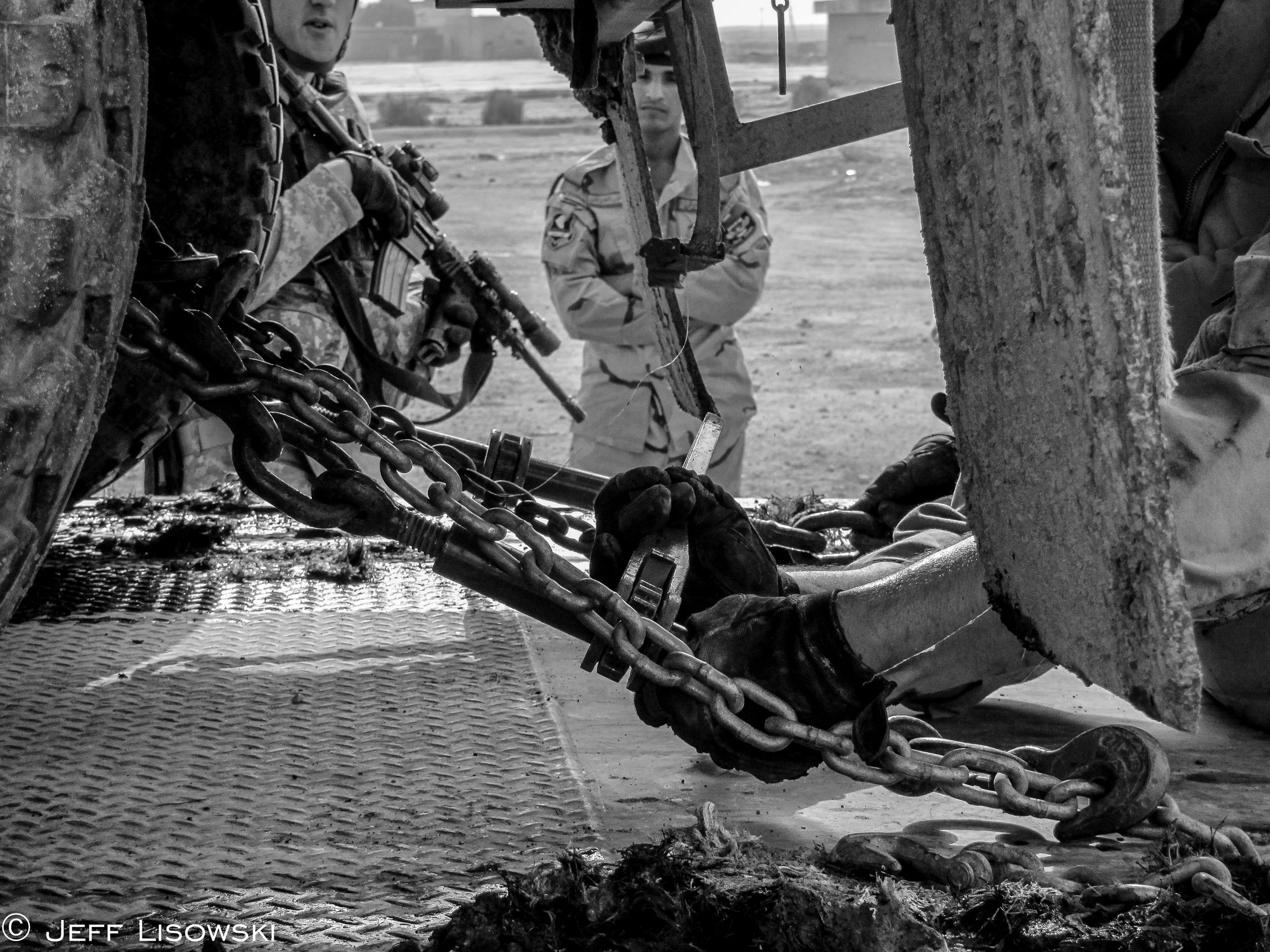Tying down equipment on the east side of Nasiriyah. Summer of 2010.