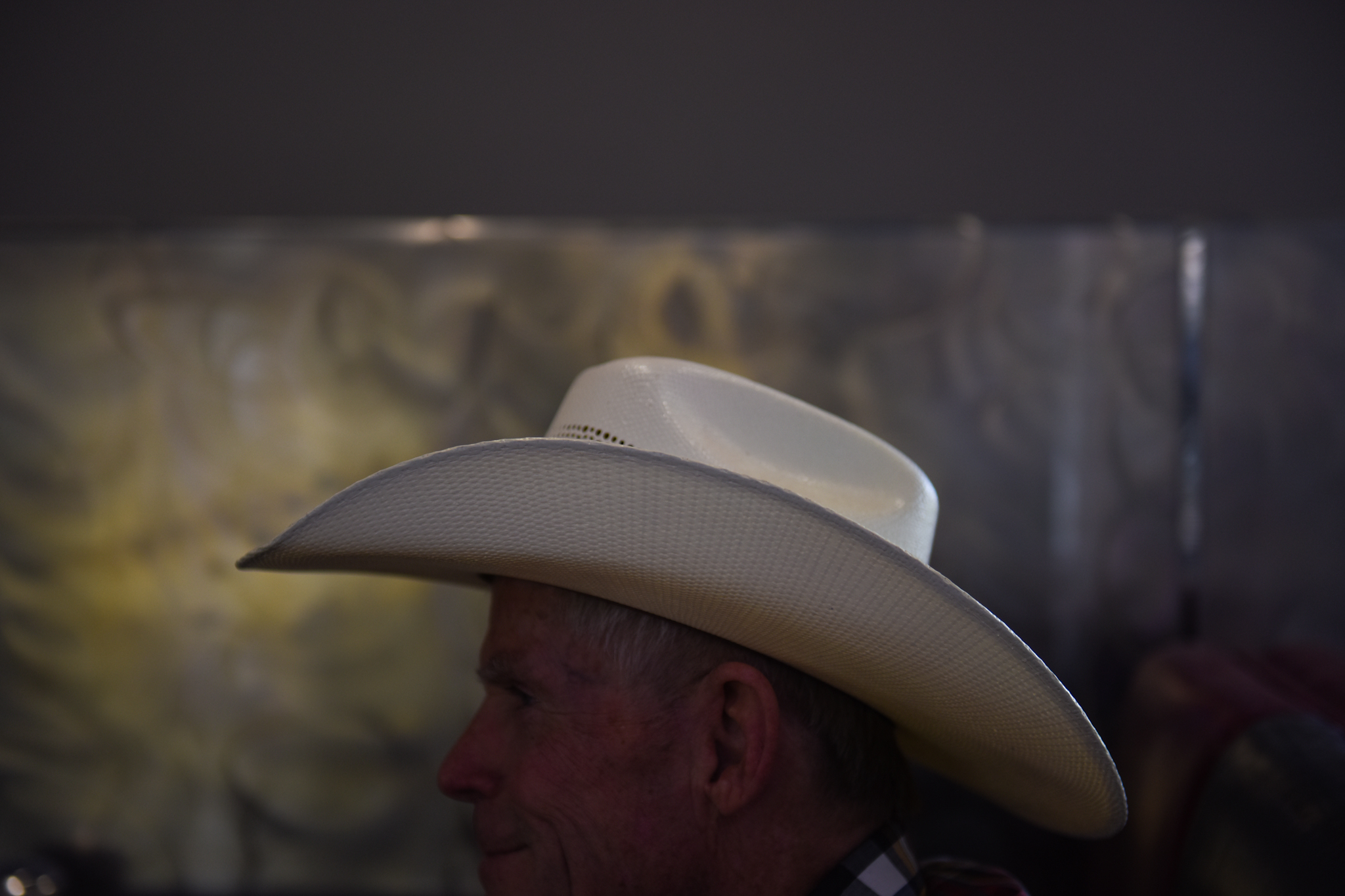 7 a.m.: Mike Carter sits in a booth as he waits for another guest to arrive.