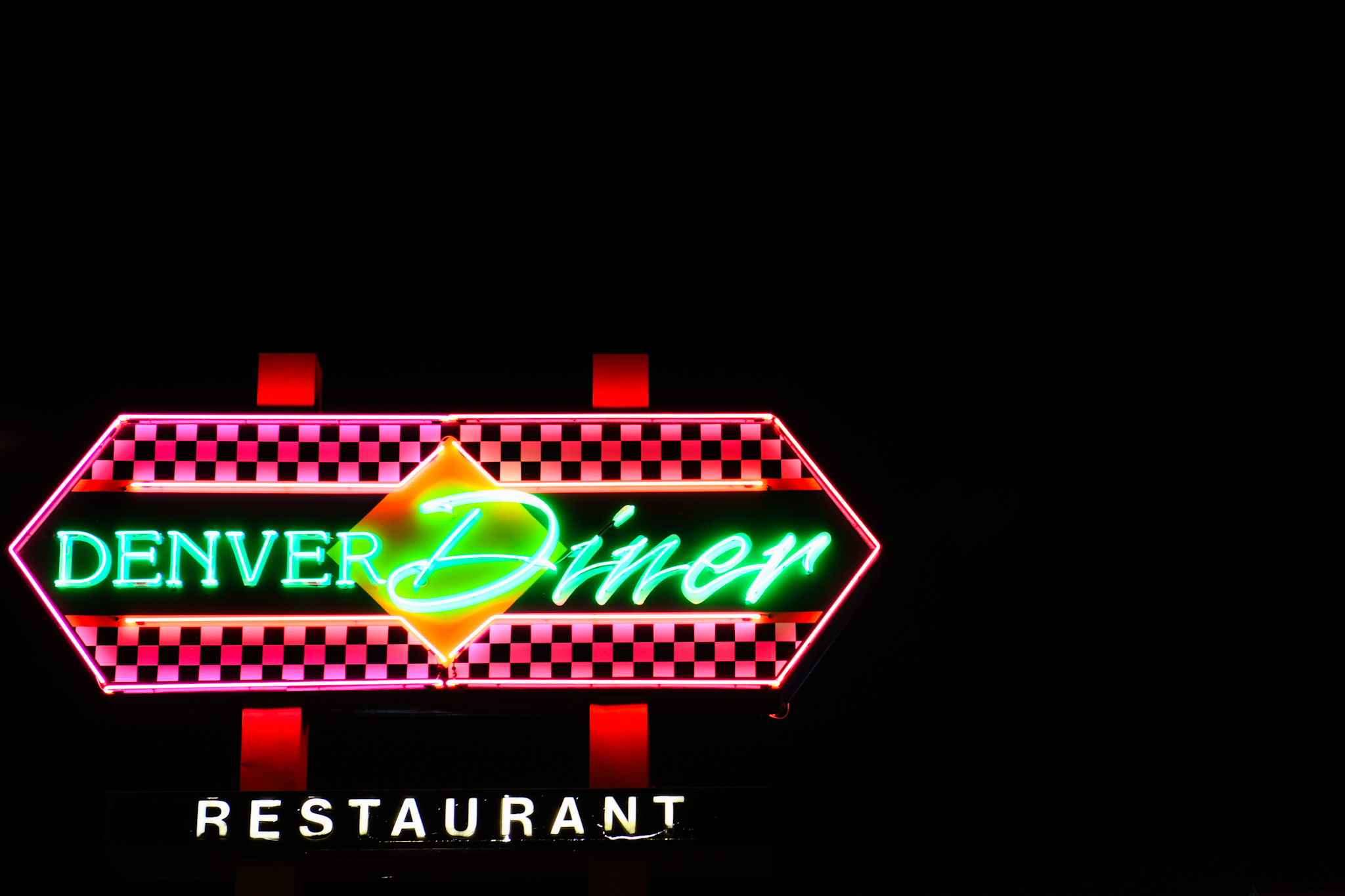 The neon lights of the Denver Diner shine on August 1, 2018.
