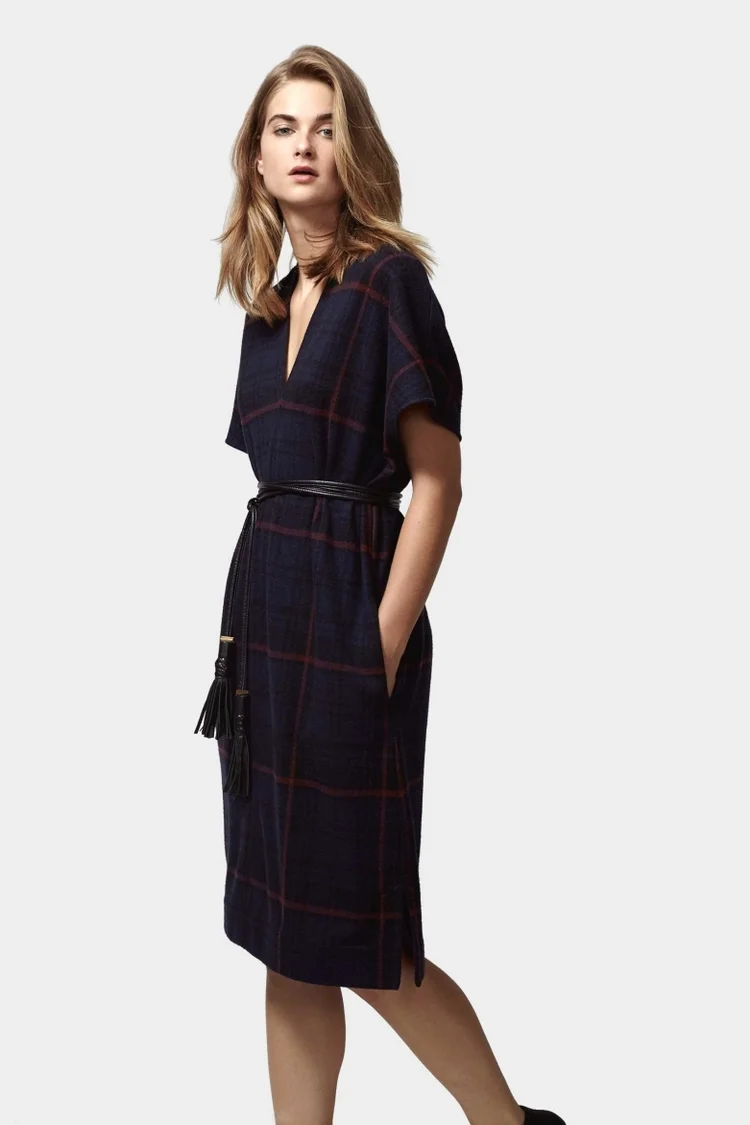 The Highlands Flannel Dress is beyond cozy and soft. Perfect for laying over a black turtleneck and thick tights.