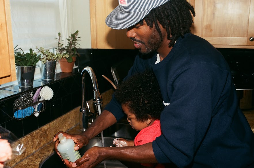 Thurz washing Kingston's hands 