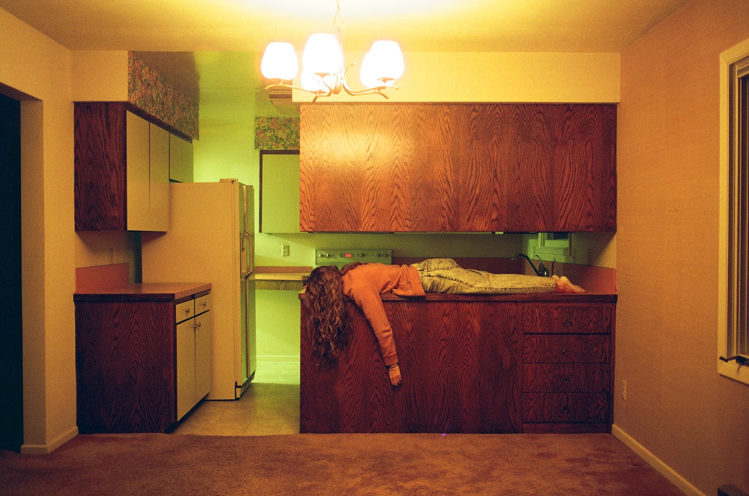 the kitchen i learned to cook in 35mm self portrait emily berkey.jpg