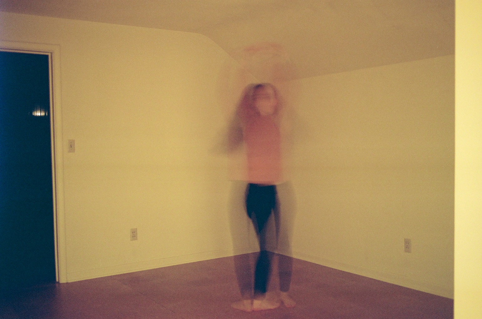 one last dance on the cork wood floors 35mm self portrait emily berkey.jpg