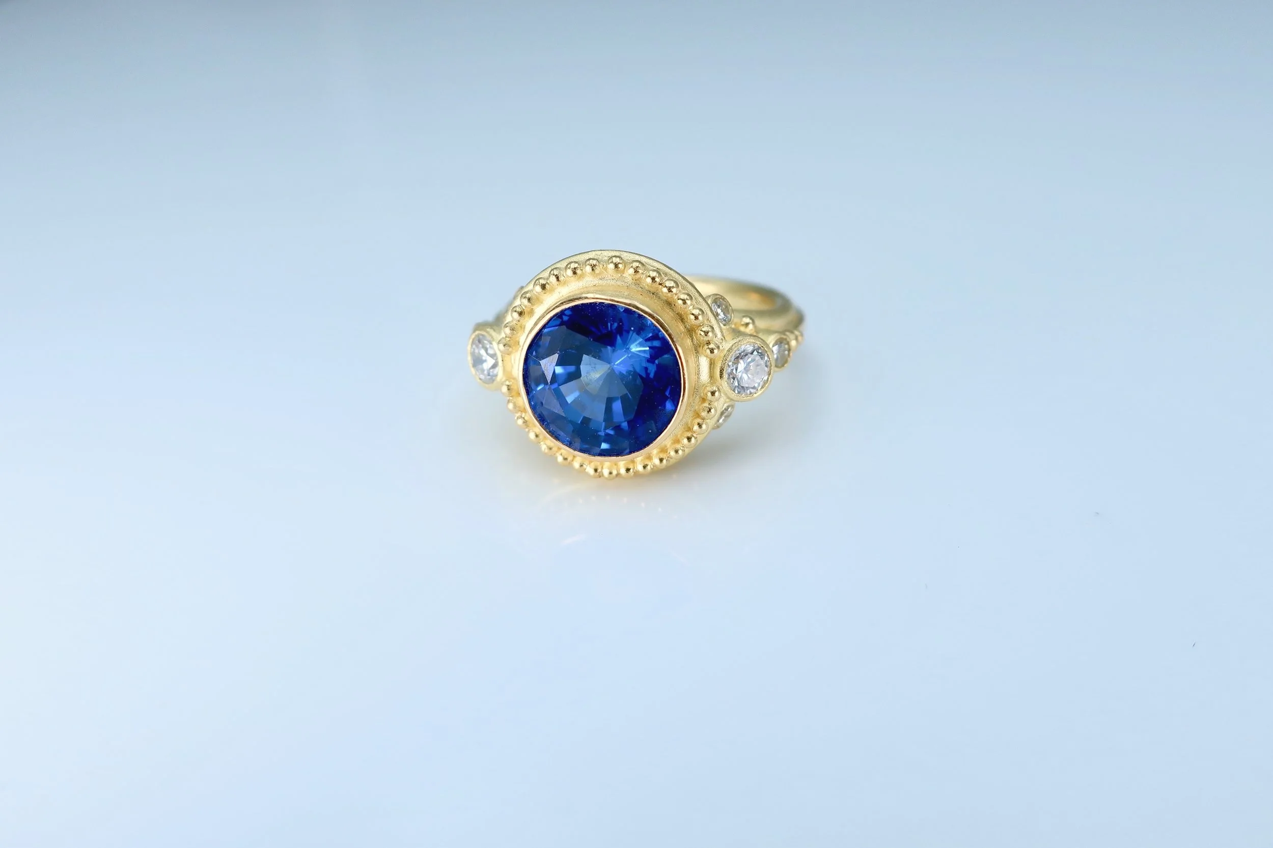 2.72ct 9mm Tanzanite, .36ctTW Diamonds, 18k