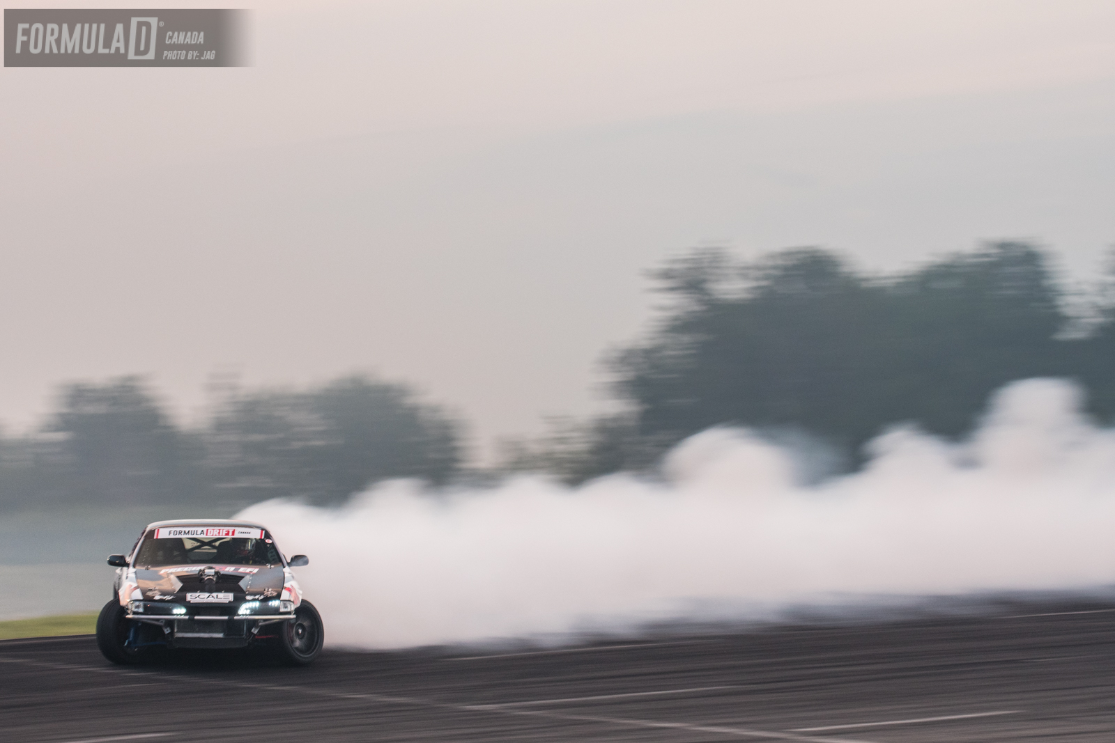 Top 8 Marc faced Jonathan Nerren in his bad ass v8 Supercharged S14. Contact was made on initiation causing Jonathan to pretty much loose drift but Marc was able too hold it down and finish his run. Marc takes the win. 