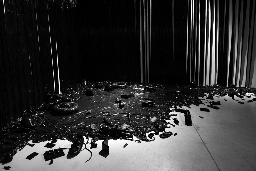 Clay Apenouvon, Film Noir de Lampedusa , 2016, extended black film with recycled objects. Mariane Ibrahim Gallery.