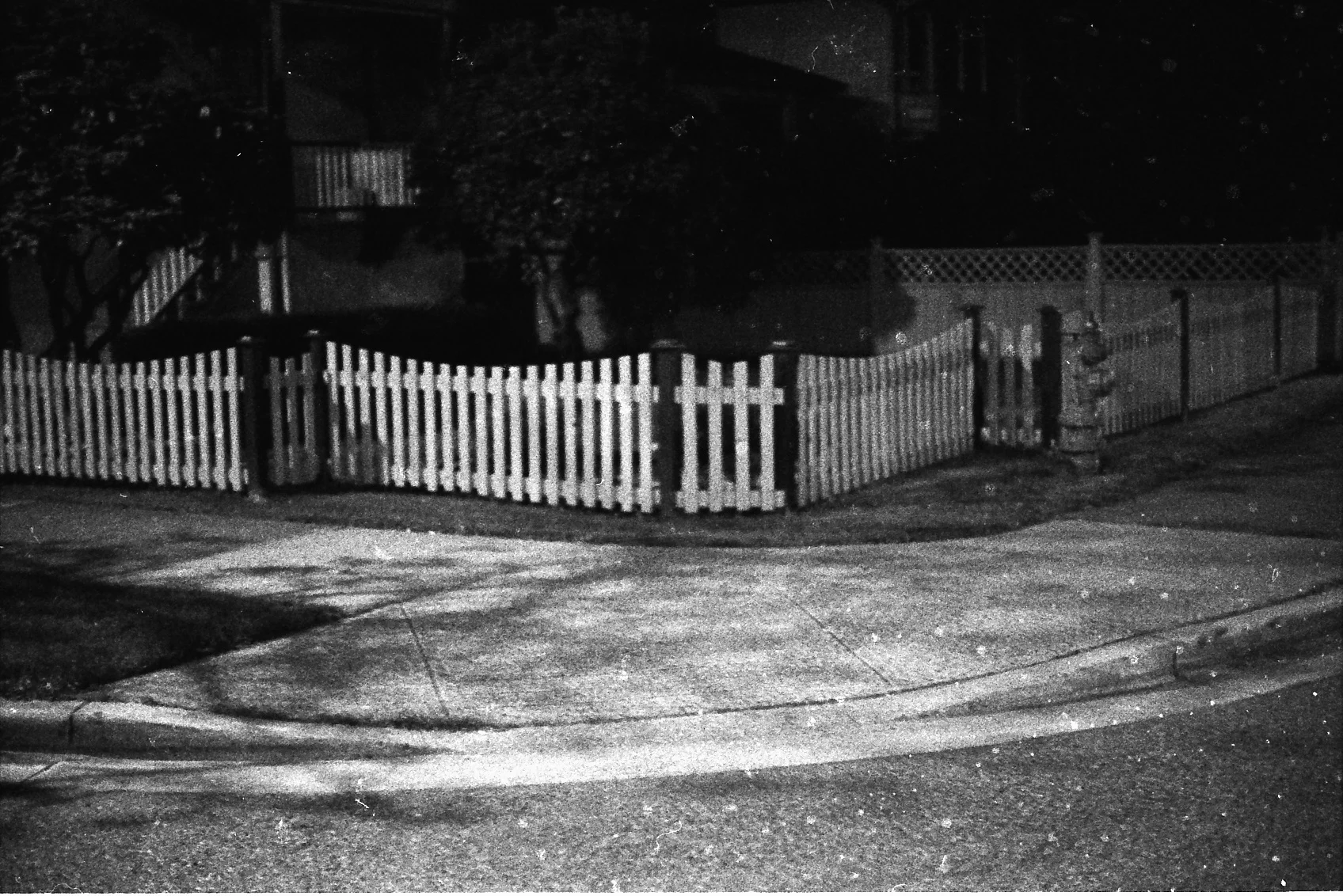 Joseph Strohan, Streetcorner Fence , 2017, silver gelatin print