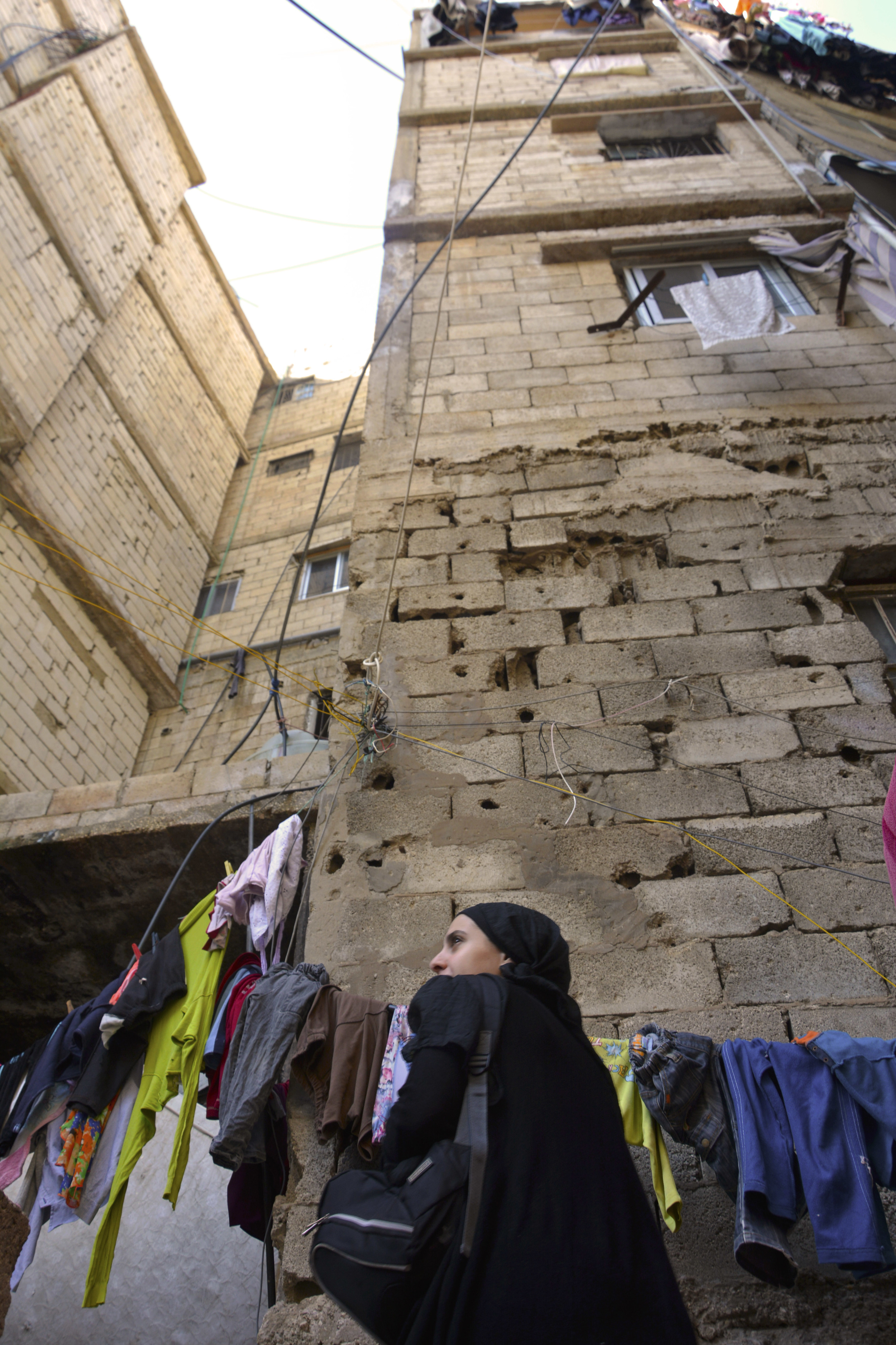  The refugees are forced to build upwards as Lebanese law forbids them from expanding their camp. The units can contain anywhere from four to twenty people. 