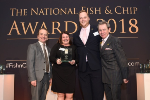 Krispies Fish & Chips with their award. From left to right Ben Bartlett, Kelly Barnes, Tim Barnes, Nigel Barden (of Simon Mayo Drivetime fame)