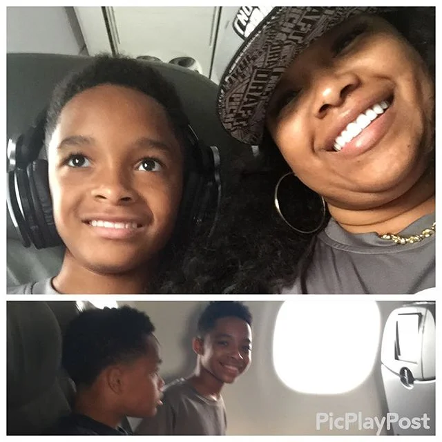 Traveling to meet daddy. They're growing up -- only had to yell a couple of times. Lol