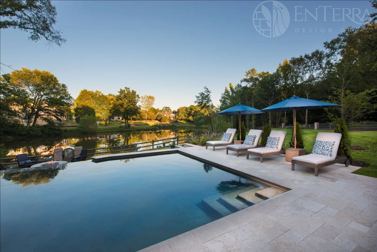 View overlooking the vanishing edge pool out towards the lower neighborhood pond.