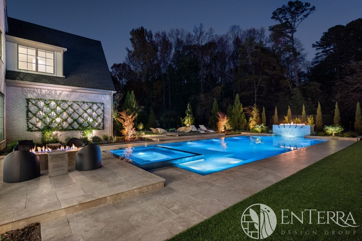 Recently completed project featuring a perimeter overflow pool &amp; spa with @crossvillestudios &amp; @island_stone finishes. Rear fire + water feature wall with separate catch basin to prevent surface water disruption of the main pool. Thanks to @p