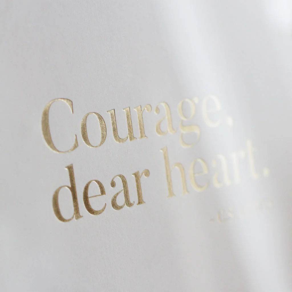 Courage, dear heart gold foiled print, close up of gold foil