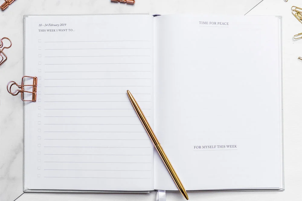 essential-planner-emily-rollings-weekly-spread.jpg