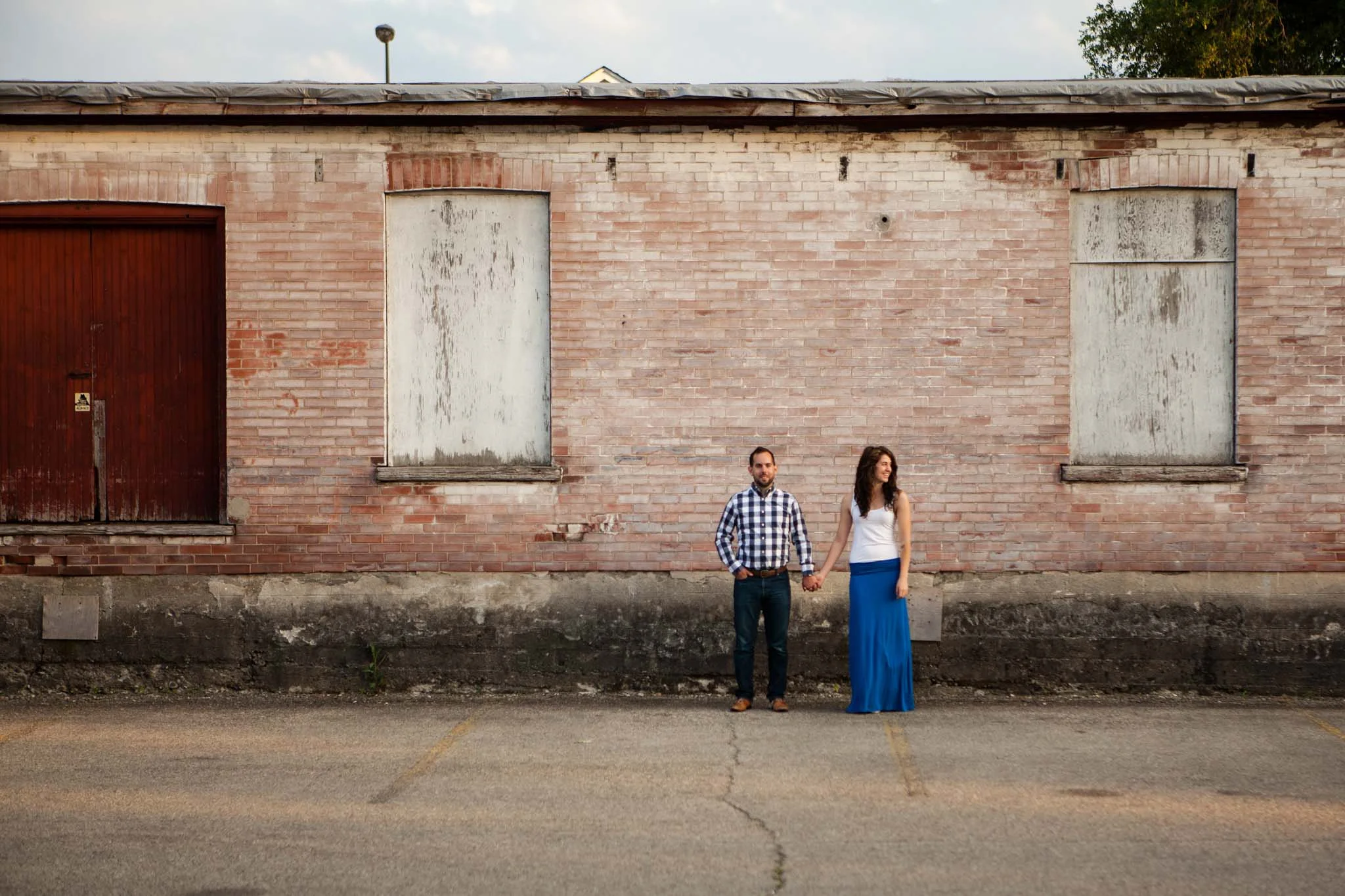 engagement photography session downtown Galt with red brick building.jpg
