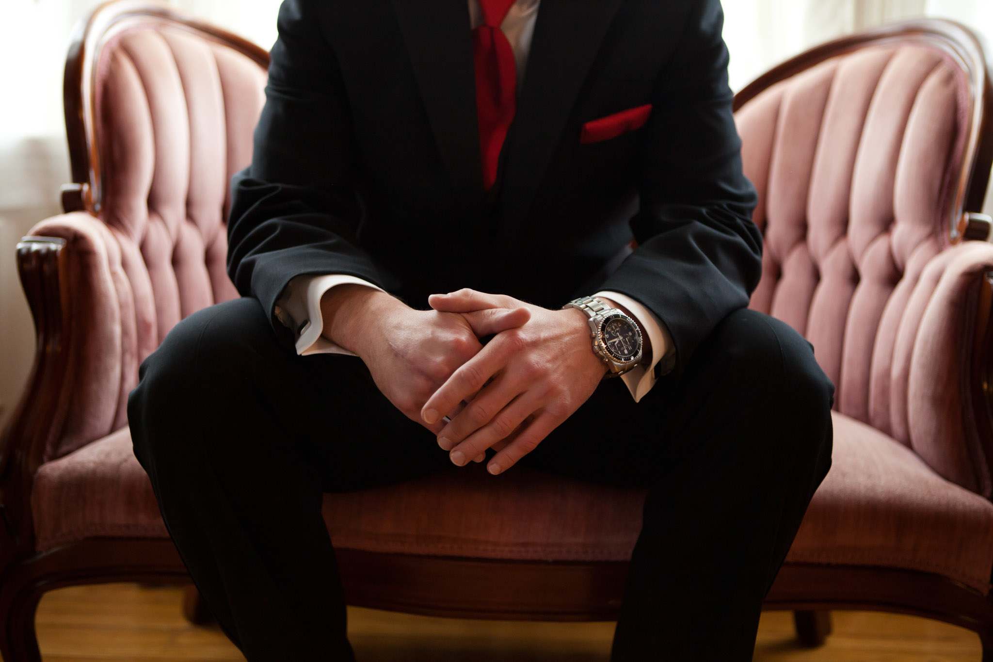 groom close up of hands and watch wedding photography.jpg