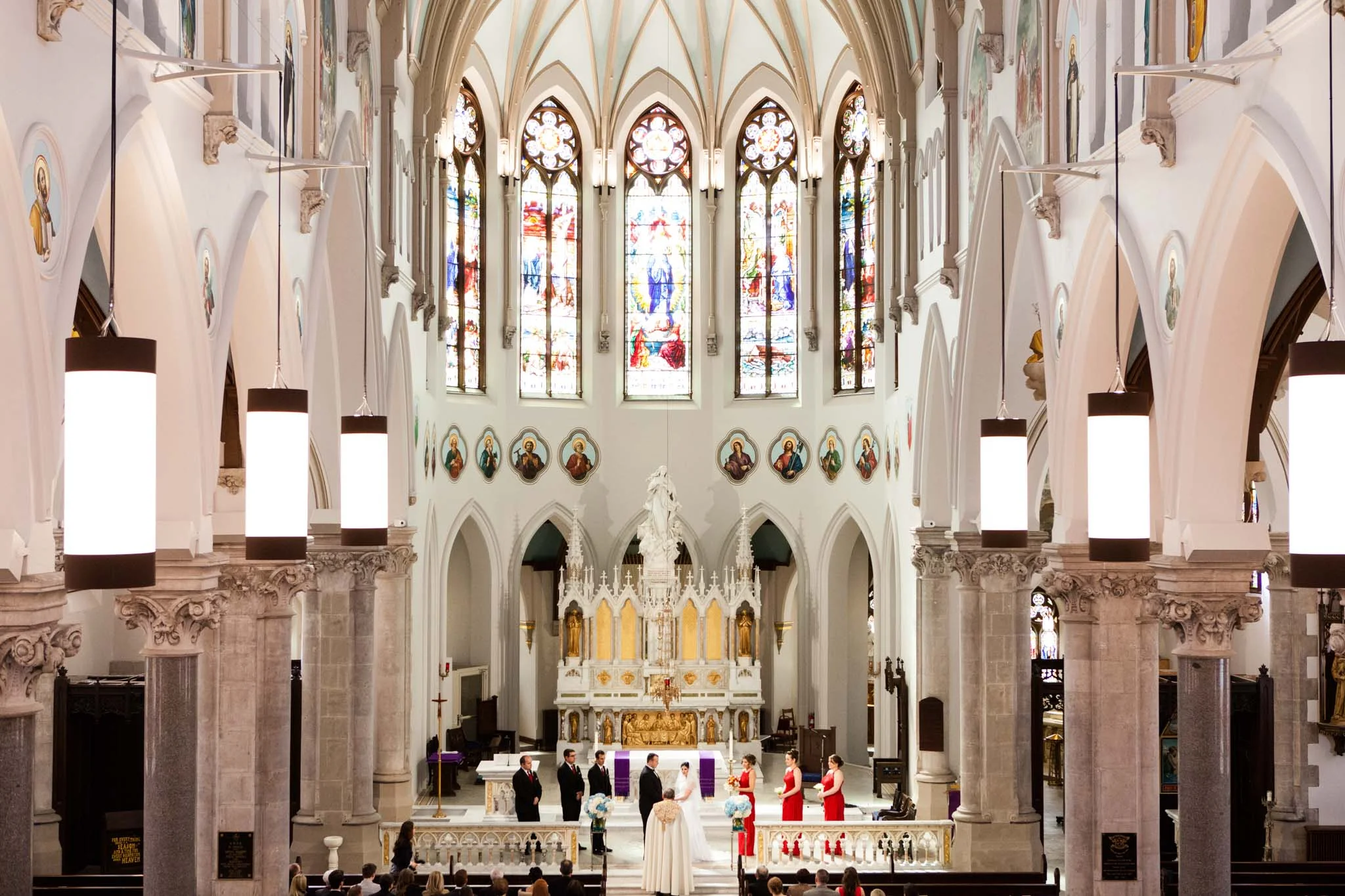 beautiful light wedding ceremony at Our Lady Immaculate in Guelph Ontario.jpg