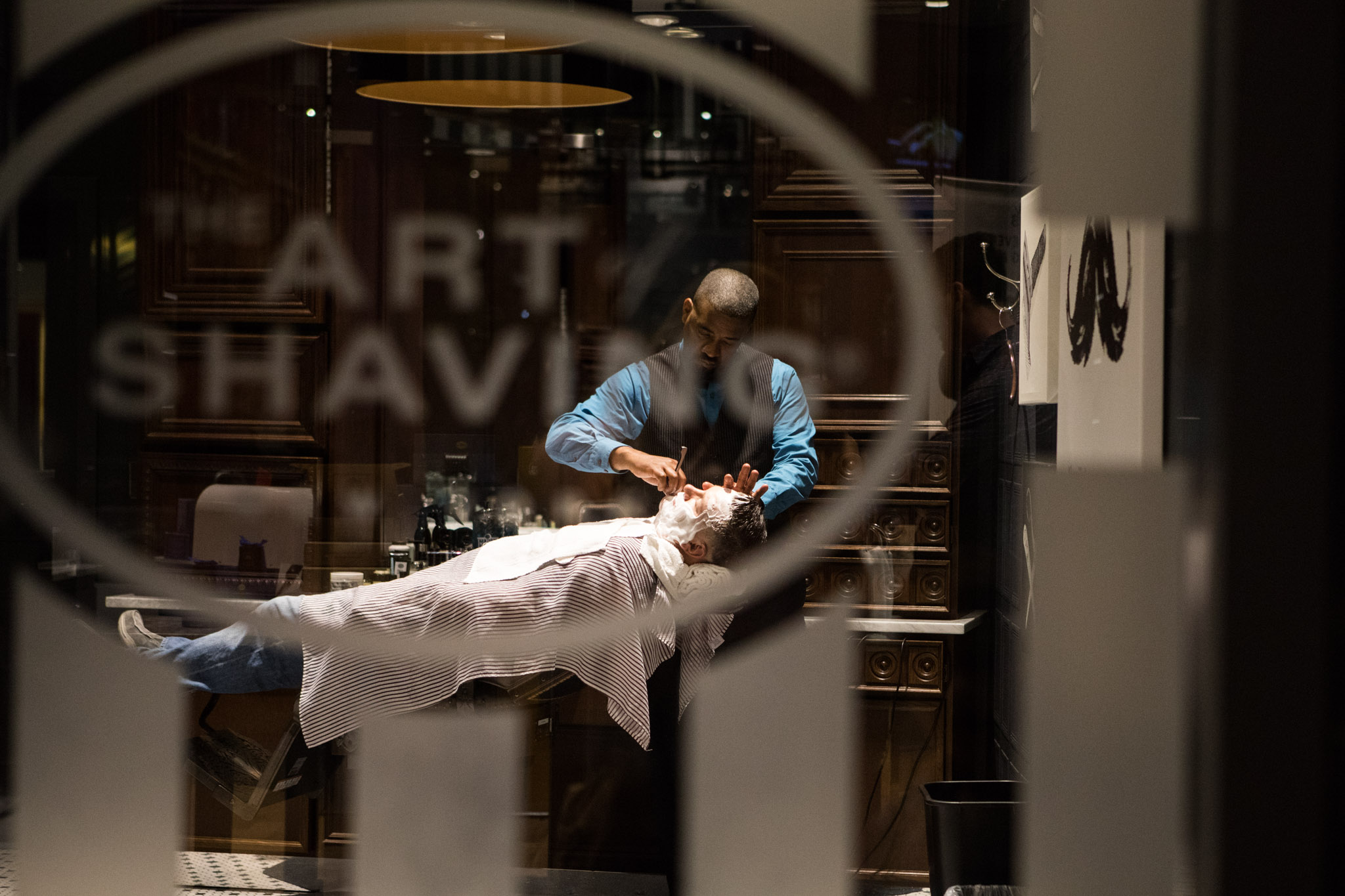 man getting a shave at Art of Shaving Las Vegas.jpg