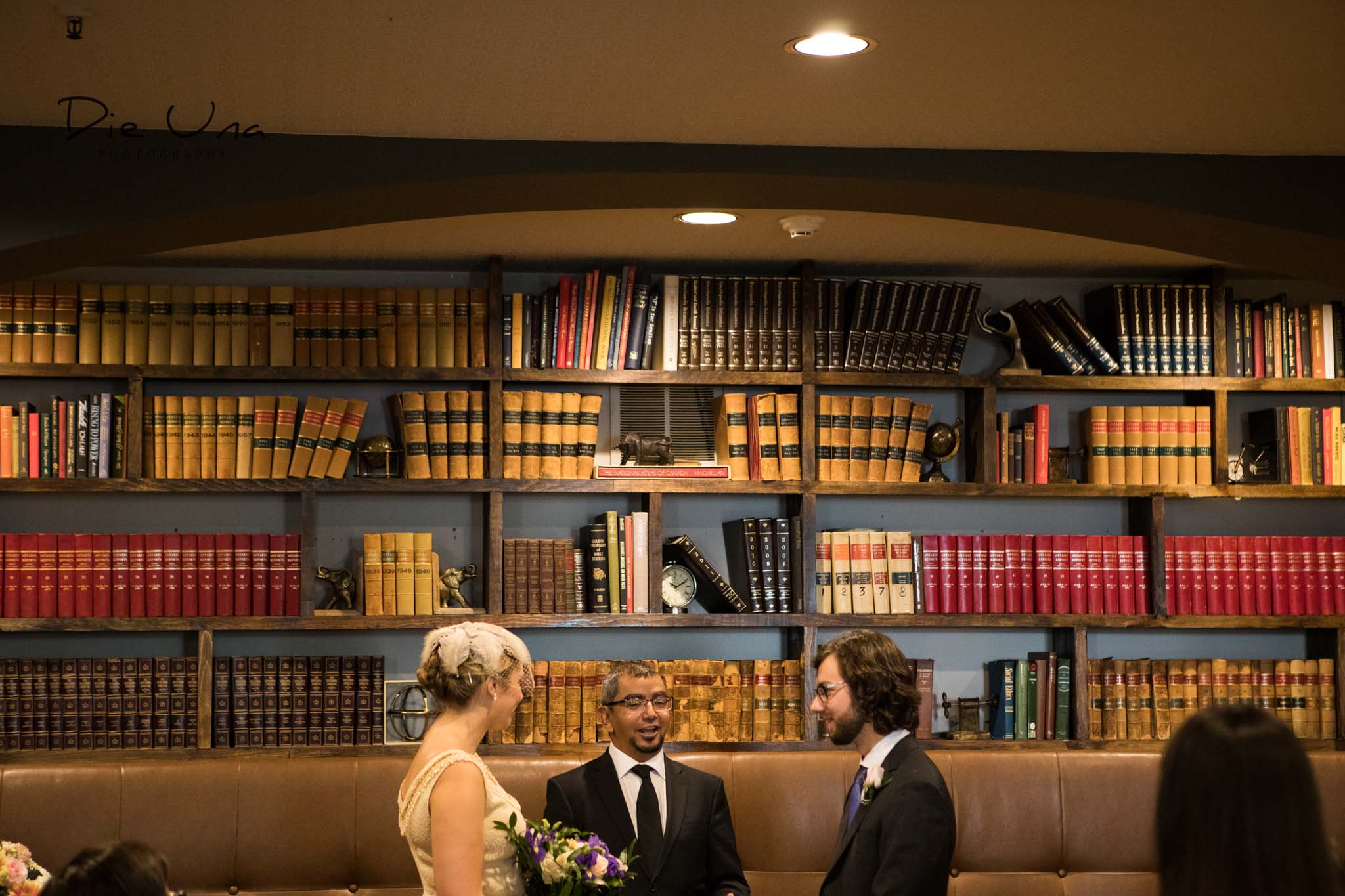  Intimate wedding ceremony in the library in the Arlington Hotel in Paris, Ontario. 