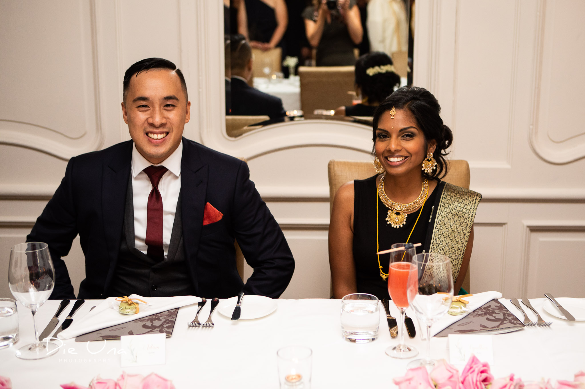 bride and groom at head table very happy.jpg