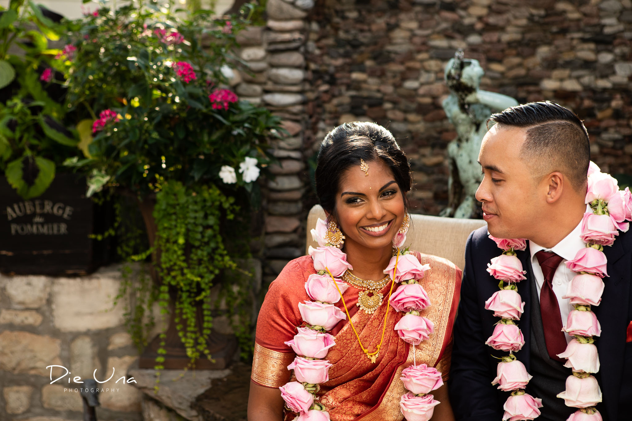 bride and groom in the terrace at Auberge du Pommier in Toronto.jpg