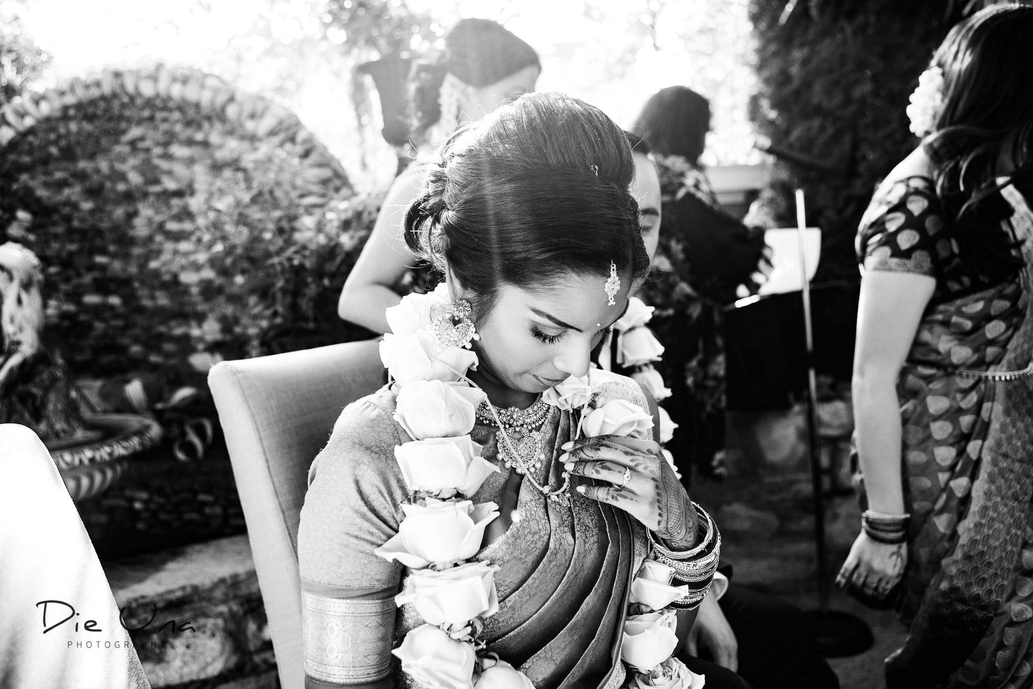 bride gazing at thaali during wedding ceremony.jpg