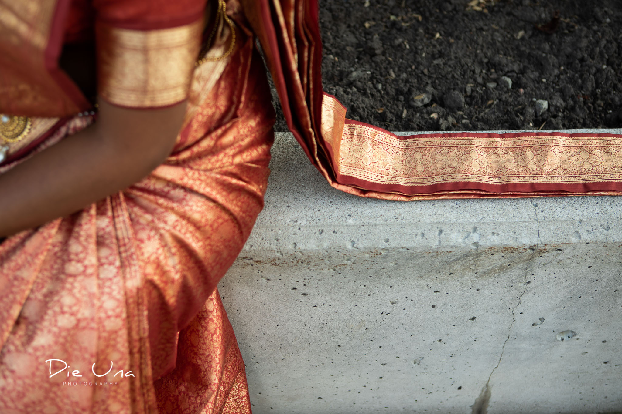 bride wearing saree detail shot.jpg